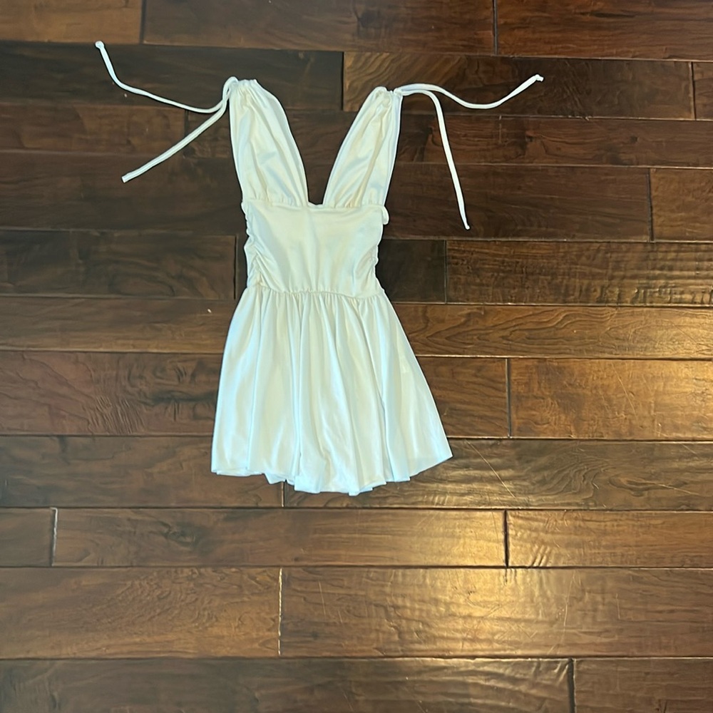 A white deep v-neck dress